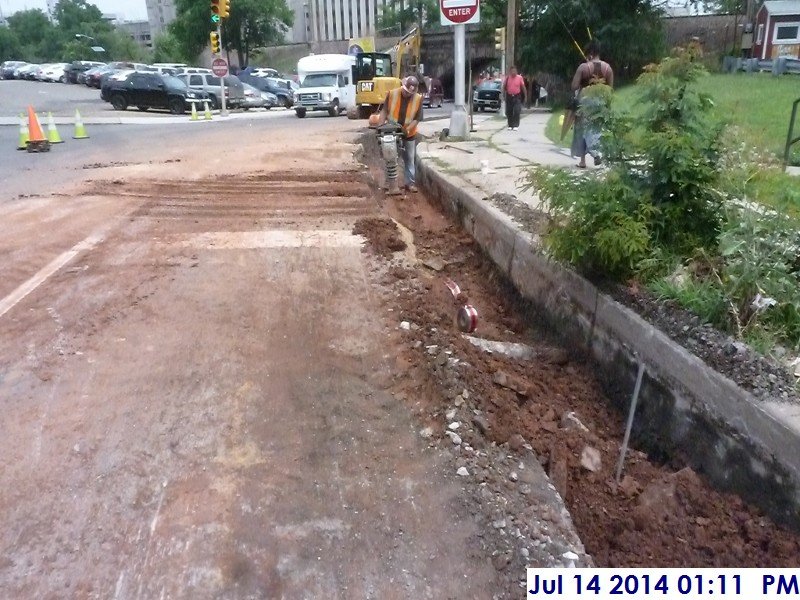 Compacting the underground piping at Rahway Ave. Facing the Administration Building (800x600)